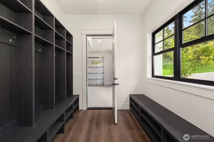 custom built ins in mud room off garage.