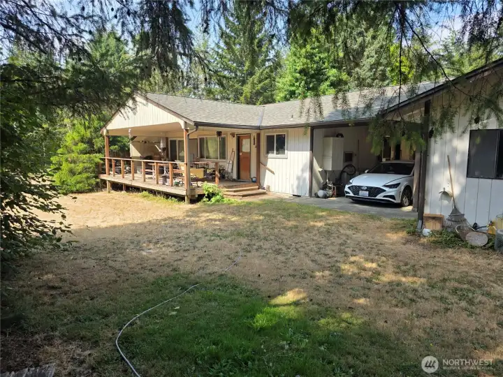 Main house with carport attached to other house