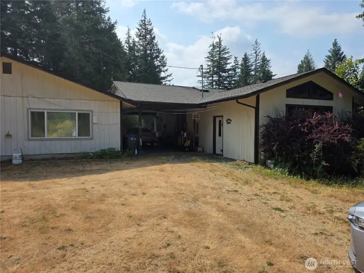Both houses with connecting carport