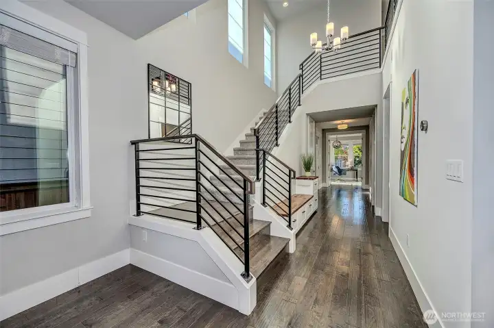 Hardwood floors throughout the main floor and up the grand open staircase