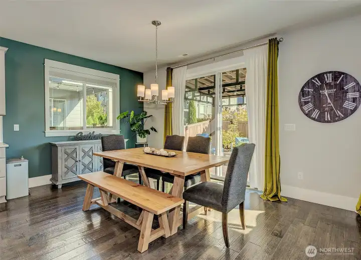 Dining area off the kitchen with sliding door leading out to the backyard