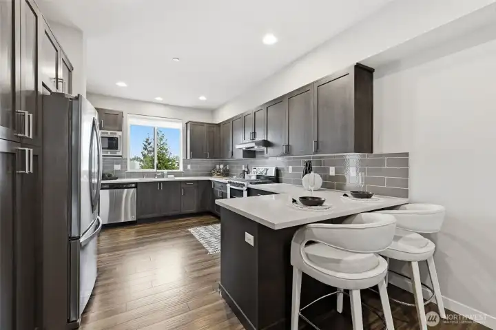 Wake up to morning views with a cup of coffee and east facing kitchen windows.