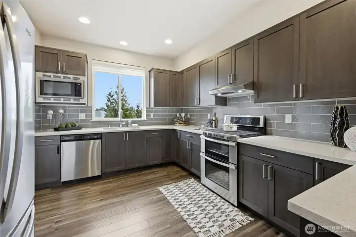 The door to the covered balcony is to the left, just past the refrigerator.