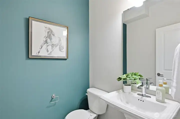 The main floor has a half-bathroom for guests.