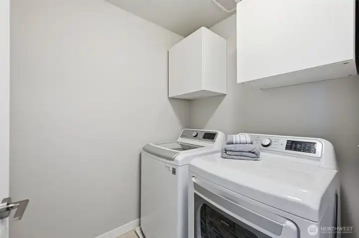 This townhouse has a full laundry room. No stackable appliances in hall closets here!