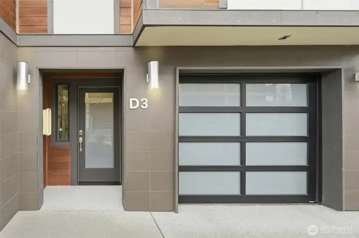 2 car tandem garage with epoxy flooring.