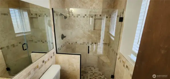 Bathroom featuring walk-in shower
