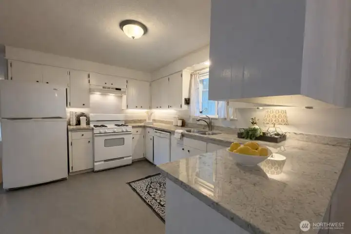 A bright and light kitchen with a view from your window