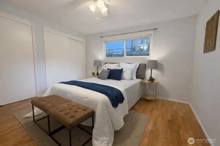 Larger of the 2 bedrooms with double closet with built ins.