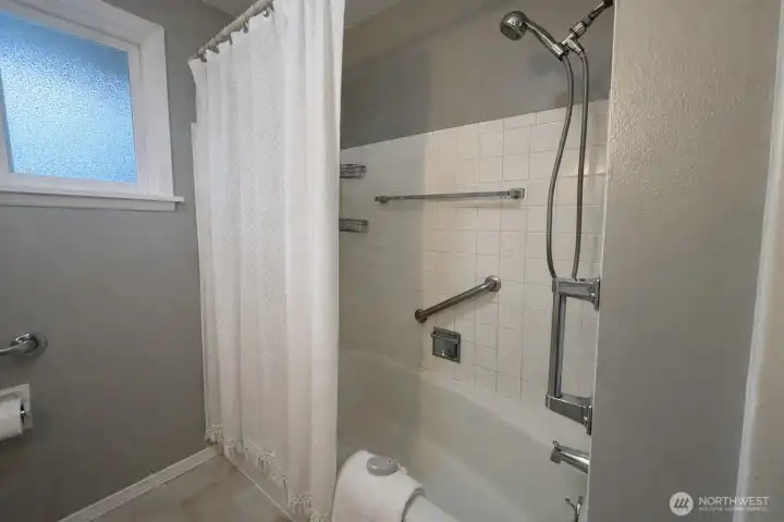 Your main bath is equipped with grab bars and is spacious with extra storage