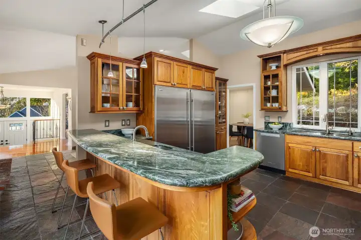 Wine Fridge and Double French Doors lead from the garden to the outdoor patio
