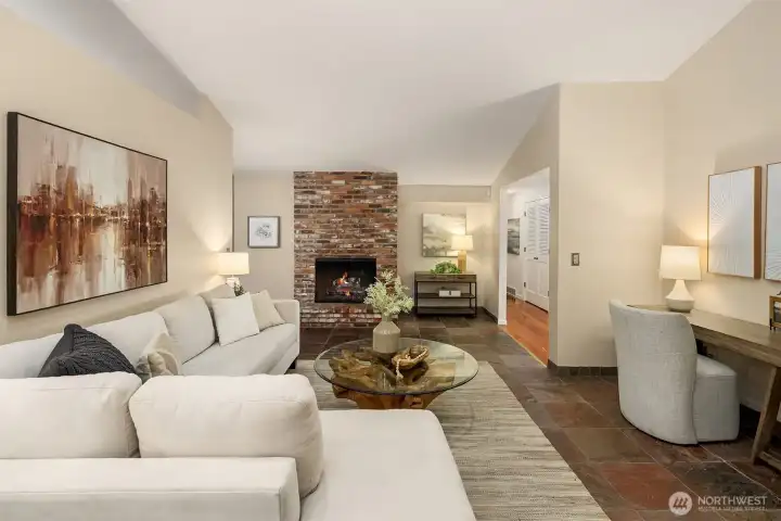 Fireplace in the Family room adds warmth this room also has skylights and vaulted ceiling