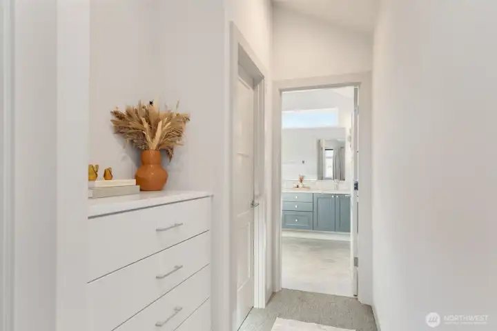 Built-in dresser next to the walk-in closet