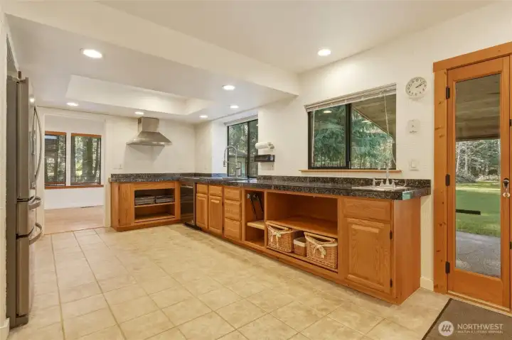 Kitchen offers lots of counterspace and views to the backyard