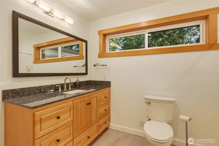 Modern 3/4 bath off main floor primary bedroom