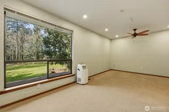 Large primary bedroom on 2nd floor with wonderful views of the back yard