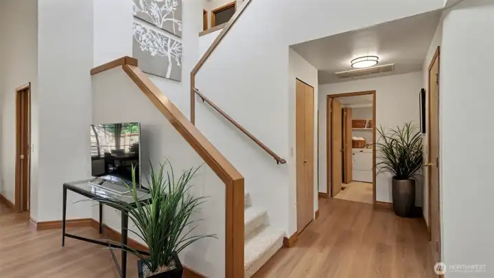 This is the entry to the home with the vault living room and stairwell.