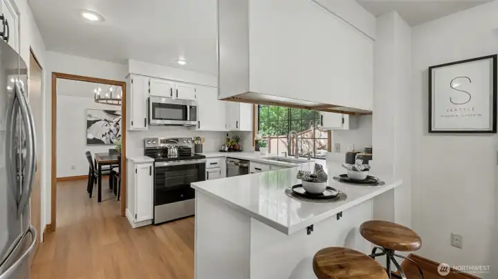 The kitchen  has been recently update with white paint, stainless Steele appliances All appliances remain.