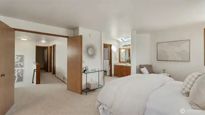 Double doors into the primary bedroom.
