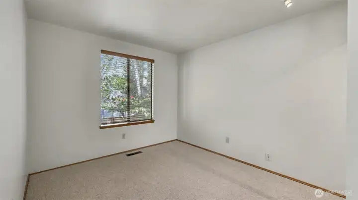The second of the total 3 bedrooms. The entire home has brand new carpet throughout.