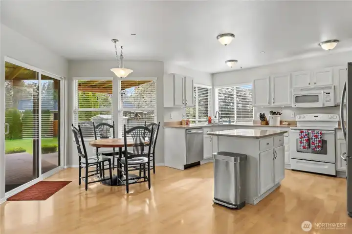 Open floorplan living with dining, family room and kitchen off the back of the home.