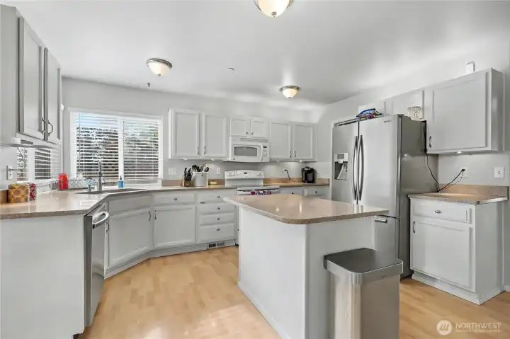 Functional layout with quartz countertops.