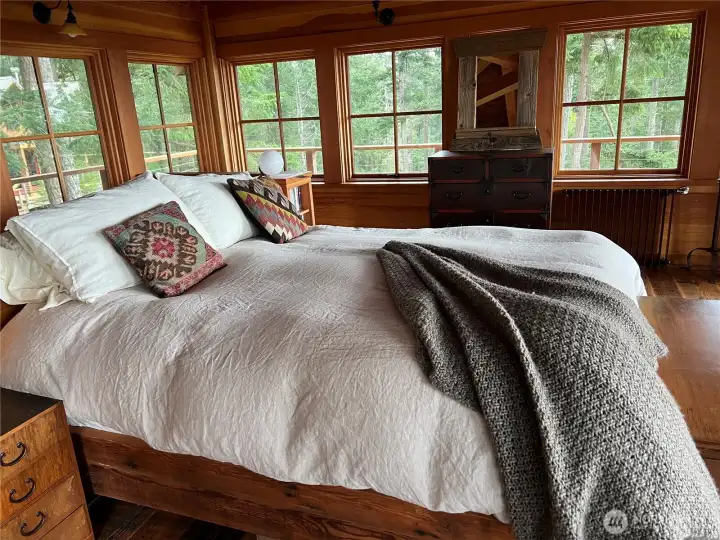 Luxurious primary bedroom with 360 degree views