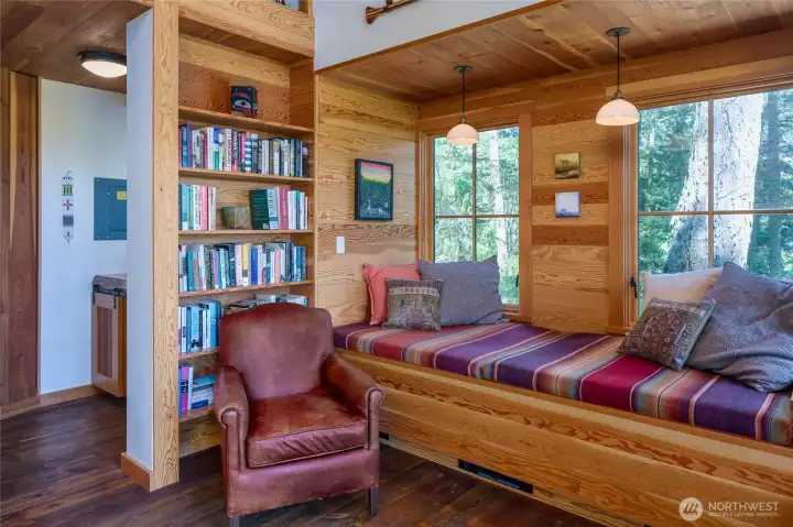 Window seat can be made up as a twin size bed w/storage below