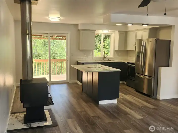 Kitchen w/eating area and wood stove