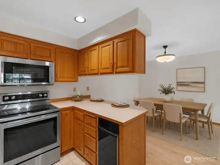 Kitchen into the dining room (Virtually staged)