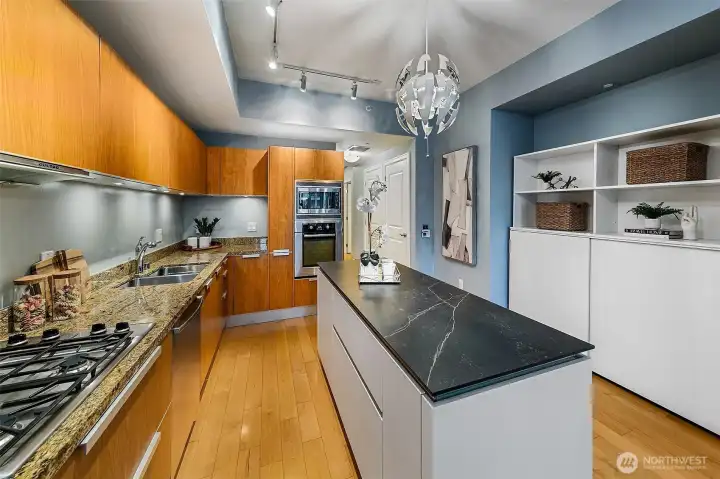 added more storage just across from island- detachable if you wanted to put home office in this location