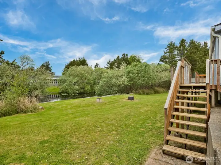 Large backyard with room for recreation, gardening, or future outdoor use.
