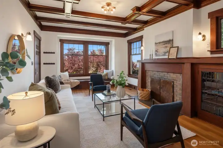 The box beams almost distract from the other craftsman touches such as the leaded glass built-ins and fireplace mantle. The box beams almost distract from the other craftsman touches such as the leaded glass built-ins and fireplace mantle.