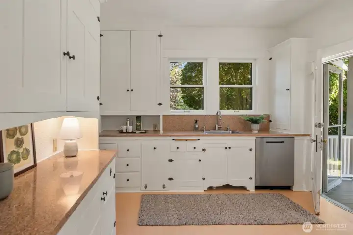 An incredible amount of storage and counterspace with easy access to backyard barbecues on the patio and deck. An incredible amount of storage and counterspace with easy access to backyard barbecues on the patio and deck.