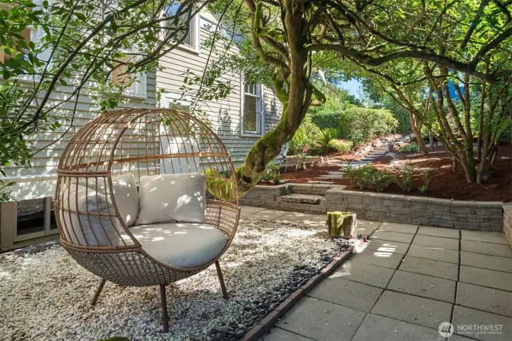 A third patio is a relaxation paradise tucked in to the lush landscape. A third patio is a relaxation paradise tucked in to the lush landscape.