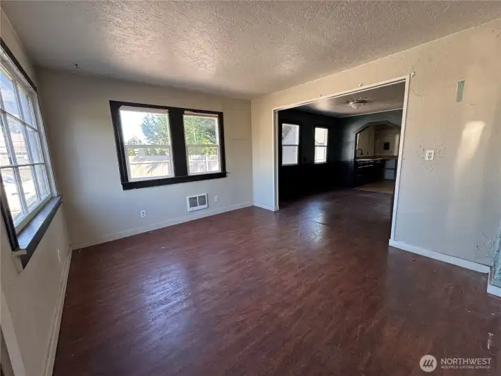 Living room looking into dining room.