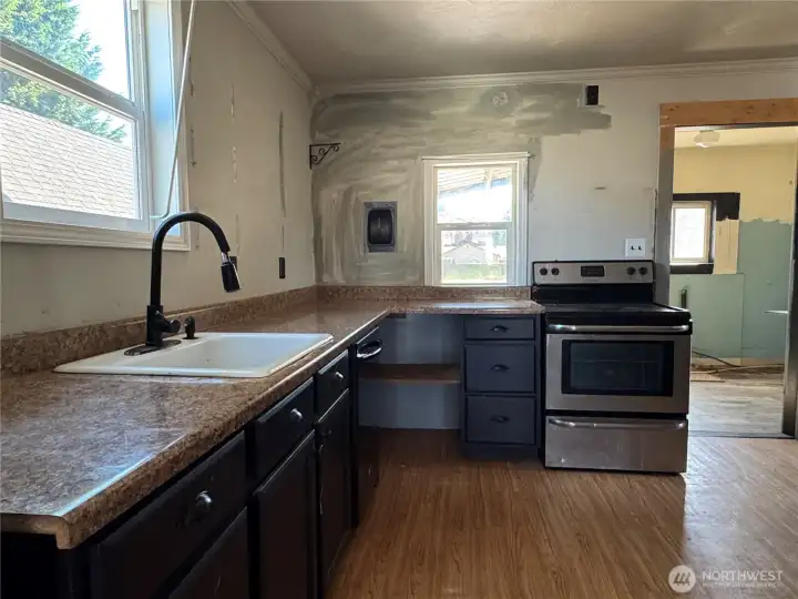 kitchen with stove and dishwasher