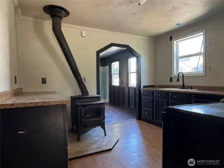 wood stove in kitchen does work and heats the house