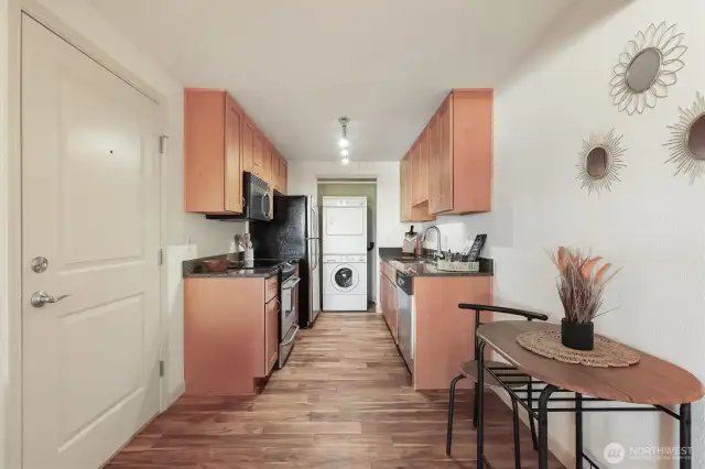 In unit washer and dryer makes laundry day convenient.