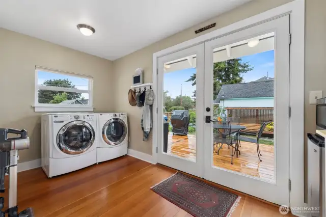 The laundry area is just off the kitchen and there is plenty of room should one wish to put a stationary bicycle or workout equipment. The French doors open out to the rear yard which is an oasis...