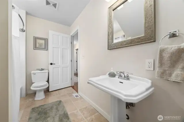 Looking toward the hall in the full bath.