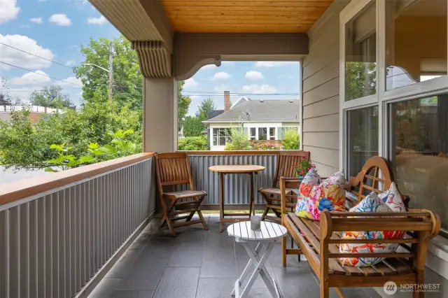 The front sitting porch is south-facing and is the perfect spot for a cup of coffee in the mooring...or a glass of wine in the evening!