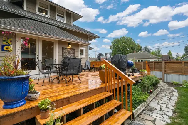 The laundry room has a mini bar area that opens to this fabulous back deck which is ideal for entertaining...in fact, the entire property is perfect for that!