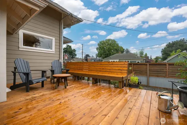 Another view of the built-in seating area on the deck above the private alcove and the garden area.