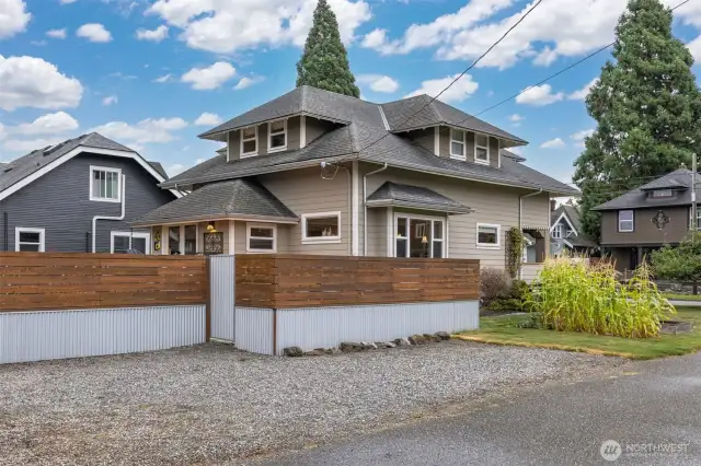 There are 3-4 off street parking spaces, as well as a vegetable garden along the Farragut Street side of the home.