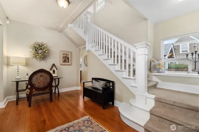 The entry is very welcoming and the original fir floors have been refinished and all the woodwork has remained, keeping all the character from the original build in  1910.