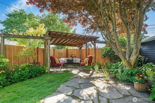 This yard has so many super features, with inviting places to hang out and relax