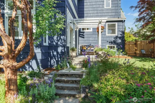 Fully-fenced backyard features brand new fencing with handy gates for flow/access