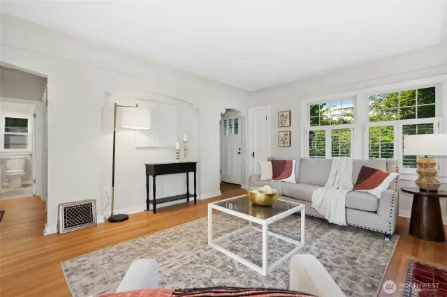 Living room with entry in background. Wait till you see the Anne Sax custom tile there - you won't believe the intricacies until you see it in person!