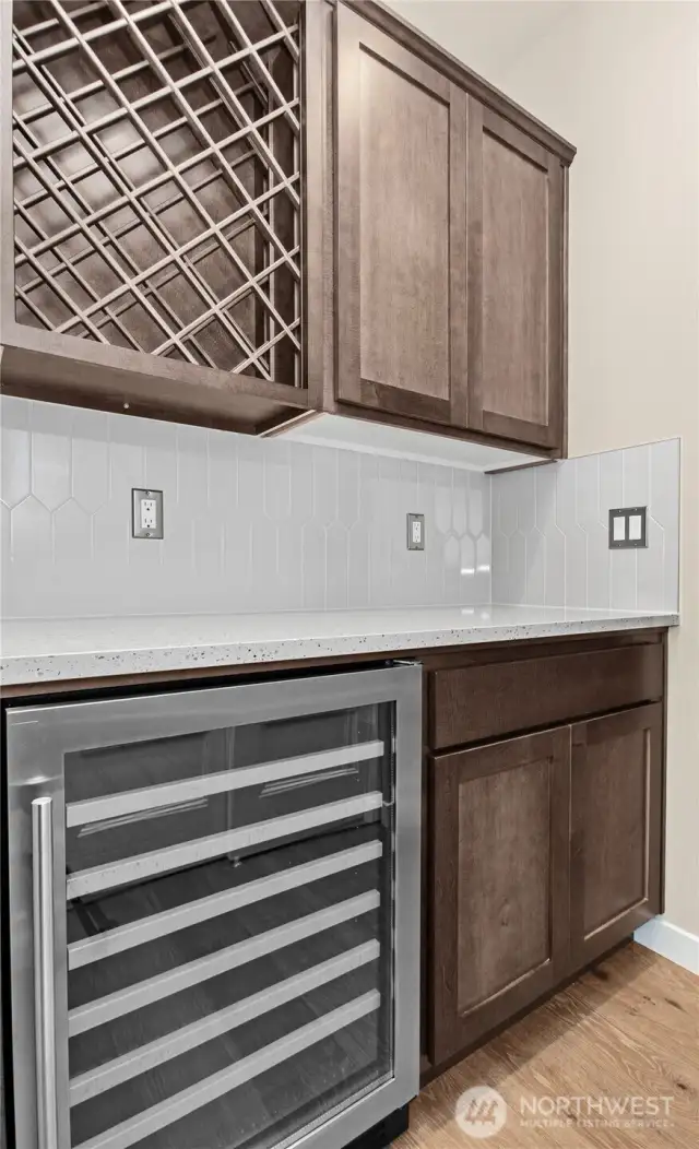 Home is under construction.  Photos, including virtually staged, are of a previously bult home in a different community with similar finishes.  Builder reserves the right to make changes to plans & specifications without notice.  Features vary by plan.  Buyer to verify square footage.